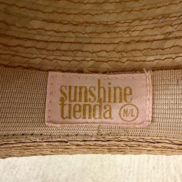 Elegant Tan Straw Hat with Multicolor Band